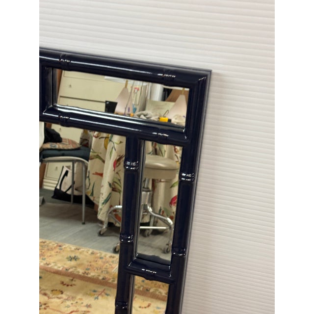 Design Plus Gallery presents a Navy Lacquered Wall Mirror. This impressive mirror will definitely make a mark on your...
