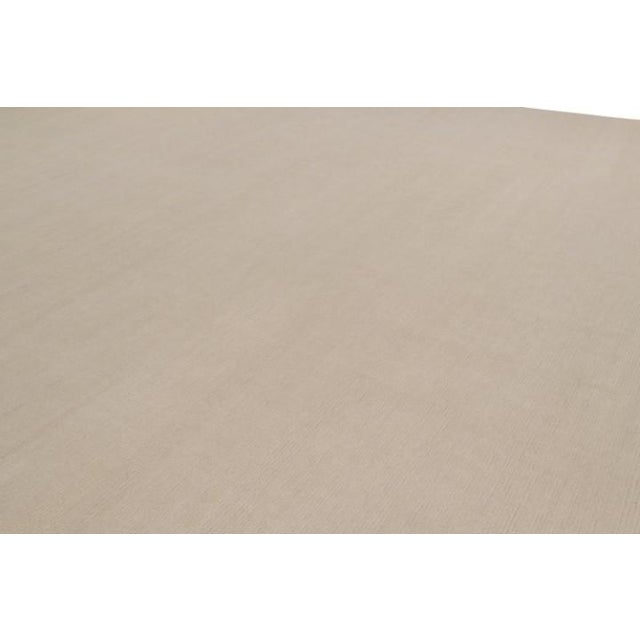 Hand-knotted in wool and cashmere, this 14x17 contemporary rug is the newest addition to the Rug & Kilim Textural...