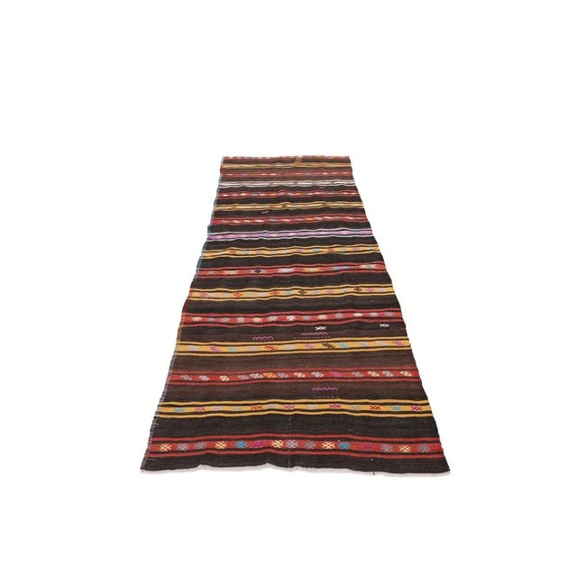 Vintage handwoven decorative kilim rug from Denizli region of Turkey. Approximately 50-60 years old. In very good condition.