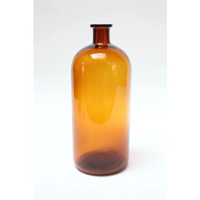 Vintage medicine/apothecary bottle known as a "Druggist's Packing Bottle" by the Illinois Glass Company (an early producer...