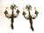 Pair of Louis XVI style gilt bronze wall sconces, with two light arms, richly decorated with scrolls and acanthus leaves....