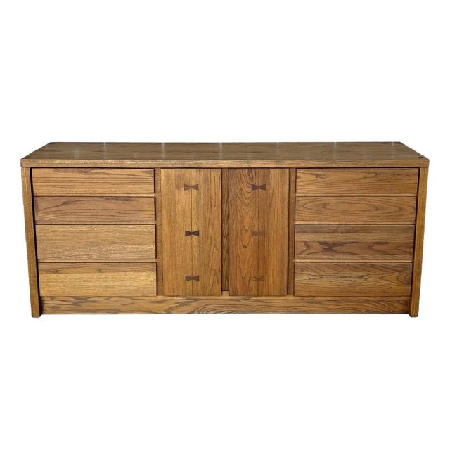 Classic mid century solid oak dresser or sideboard from Russell Wright for Conant Ball. Easily functions as a dining room...