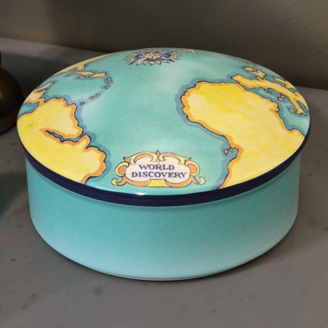 The Vintage Tiffany Trinket Box with a "World Discovery" Map pattern is a luxurious decorative collectible from the...