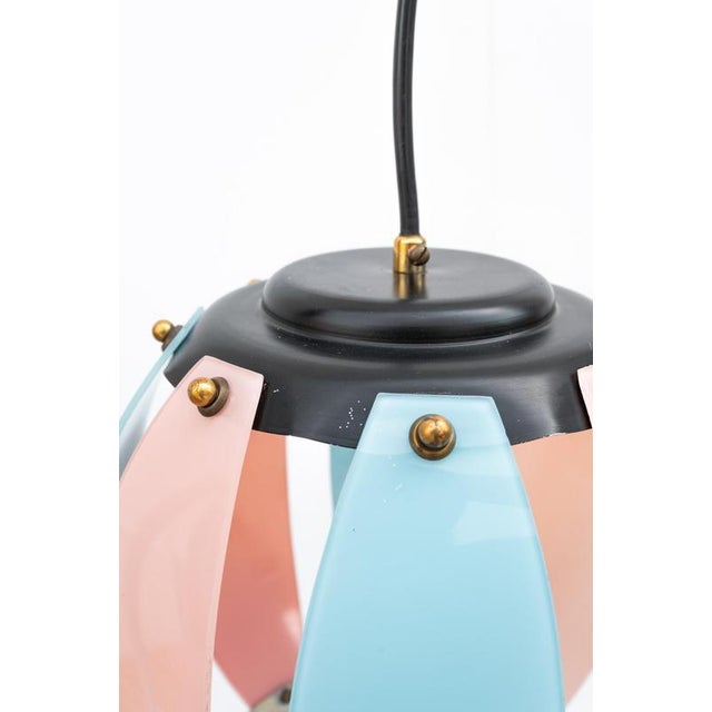 Rare Chandelier with globe lampshade, Made in Italy, 1970s. Globe chandelier made of curved light blue and pink glass...