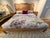 Transform your bedroom into a serene sanctuary with this striking statement piece that beautifully bridges classic French...
