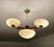 Large Art Deco pendant light from the 1930s, fully rewired, featuring a wood structure with brass and trim, large central...