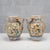 This pair of majolica apothecary jars, dating from the mid-20th century and produced in Deruta, masterfully recreates the...