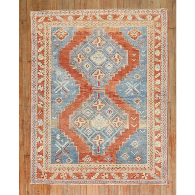 3rd quarter of the 20th century Kazak Rug in blues and tomato red Details rug no. j3337 size 4' 3" x 5' 1" (130 x 155 cm)