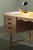 A freestanding brutalist desk attributed to Danish designer Henning Kjærnulf, made in Denmark circa 1960. Built from oak...