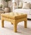 Vintage tufted ottoman upholstered in a rich golden yellow velvet with a subtle basketweave texture. The generously padded...