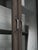 Rustic Dark Wood Glass-Front Cabinet on Tiered Open Base For Sale - Image 3 of 5