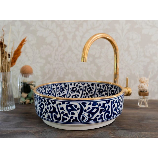 Our Moroccan Ceramic Sink is stunning addition to elevate your bathroom decor. Handcrafted with meticulous attention to...