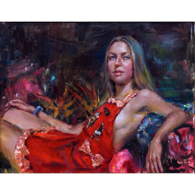 The painting "Apron" features a young woman reclining in a vibrant, richly textured environment, her confident gaze...
