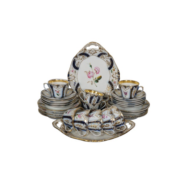 Antique demitasse tea / coffee serving set featuring teacups, saucers and dessert plates. Marked H on base. Set includes:...