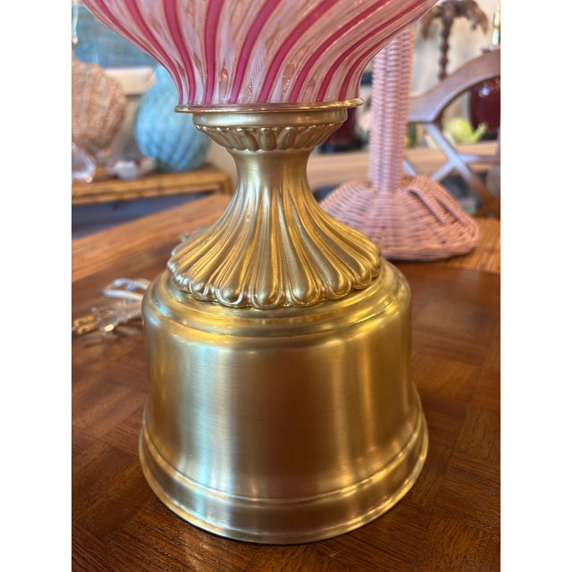 Amazing pair of 1960s Dino Martens Murano table lamps. Beautiful pink & white swirl candy ribbon like glass lamps. These...