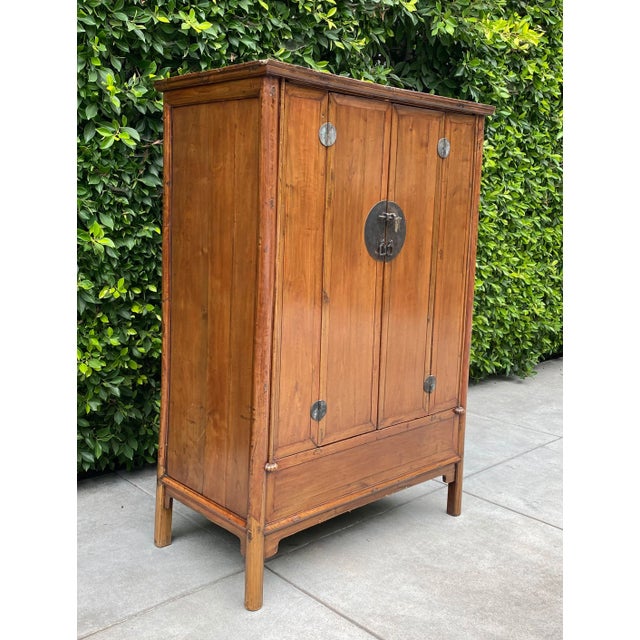 Stunning Chinese Wedding Cabinet circa 1800. This is a gorgeous antique Chinese storage piece from the Qing Dynasty,...