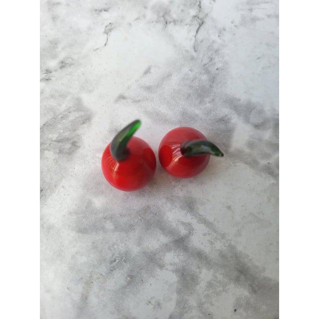 Beautiful pair of vintage blown glass cherries. They are miniature in sized. Great option for a sophisticated look in the...