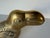 Striking 1980s vintage solid brass toucan sculpture by Dolbi Cashier, featuring a sculptural curved beak and beautifully...