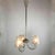 Venetian chandelier in clear blown Murano glass with regular inclusions of air bubbles in the Barovier style. A central...