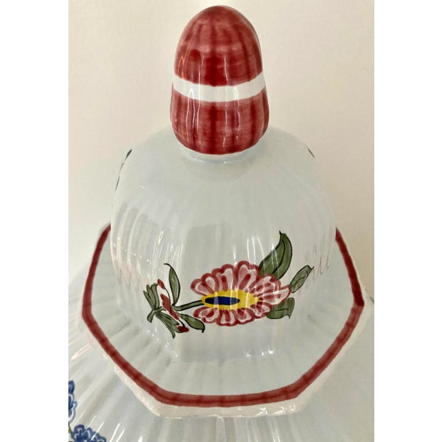 Large terracotta glazed ginger jar. made for Tiffany and Co in France. Hand painted. Features floral designs and paisleys...