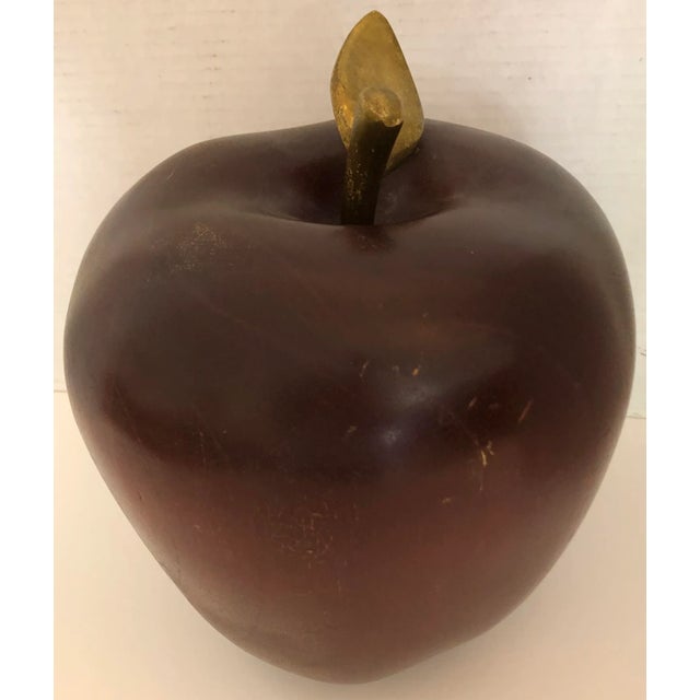 Large and heavy wood apple sculpture with solid brass stem from 70's. Some patina on brass and some small scratches and...
