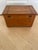 This vintage small table top chest trunk wooden box with inlay trim is a handcrafted antique piece made of wood. It...