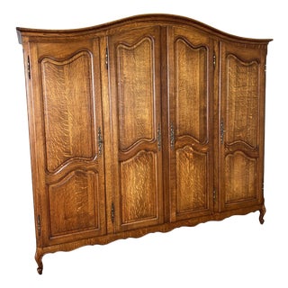 Vintage French Louis XVI Style Carved Oak 4-Door Armoire For Sale