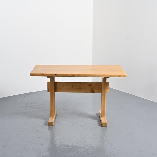 Rectangular tabletop with a solid pine stretcher base, selected for the Les Arcs ski resort. Bibliography: Charlotte...