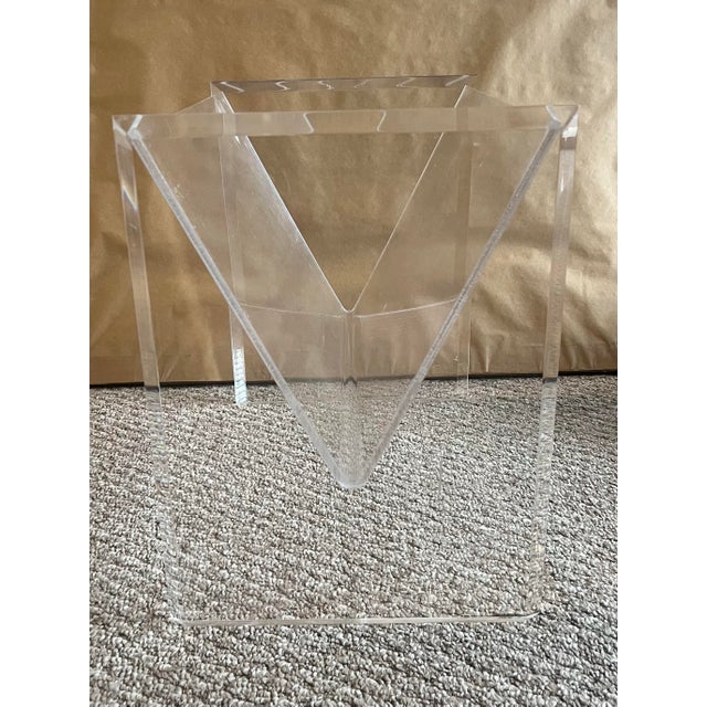 Nice, clear, lucite or acrylic mid-century modern magazine rack.
