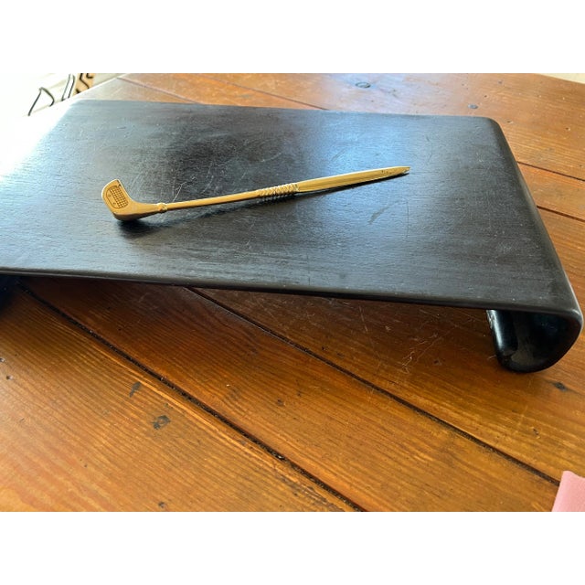 This is a beautiful brass tennis letter opener. This piece would look perfect in your office and is great for the interior...