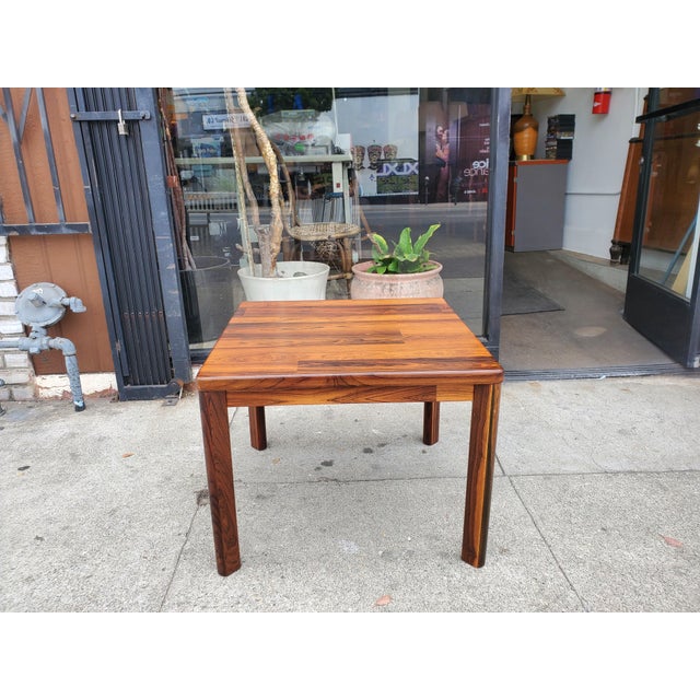 Beautiful vintage 80s rosewood side table or coffee table. The legs can be unscrewed for easy transport or storage. Fully...