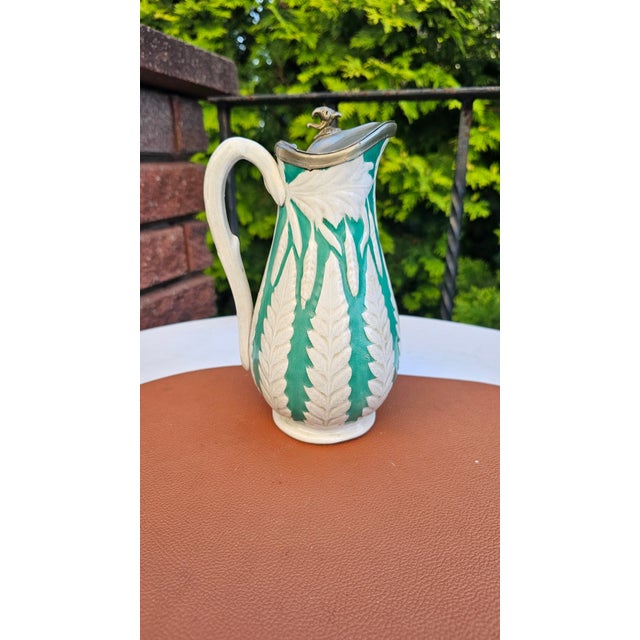 Pre-war ceramic beer mug, eagle-head handle, dimensions: height 20.5 cm; width 11.5 cm; width at widest point 9.8 cm;...