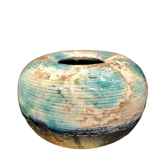 Vintage studio pottery piece, nicely glazed in a slightly iridescent drip dual sheen style. Signed “Banner”