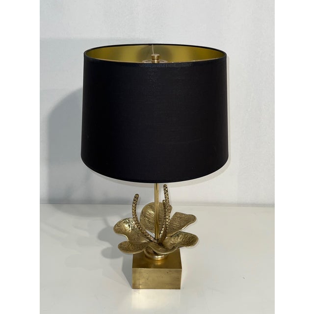 This beautiful water lily table lamp is made of bronze and brass. It is a French work attributed to Maison Charles. Circa...