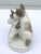 Adorable Japanese porcelain terrier figurine of 2 dogs playing. I love the creamy grayish tan spots on the dogs. Classic...
