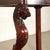 Elegant console supported by wavy front legs finely carved with lion face and feline paws lean on a mixtilineal base. Band...