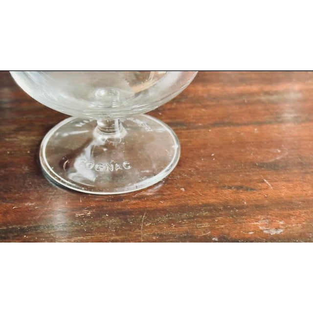 This is a set of vintage m brandy or cognac snifter crystal glasses. The wide bowl and narrow rim are designed to trap the...
