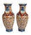 A beautiful pair of hexagonal vases with an Imari design and pomegranate handles on each side. Features red and yellow...