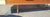 Fine and delicate mid-century modern low chest of drawers with brass handles and Brass legs. Features clean interior....
