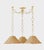 "Updating a classic silhouette with contemporary materiality, Dalia features a large, tapered shade woven from rattan...