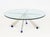 Postmodern Circular Glass Top and Chrome-Plated Coffee Table, the geometric base on four cobalt blue glass ball feet. 16"...