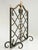 Highly decorative painted steel and polished brass fireplace screen in the style of Gilbert Poillerat made by the artisans...