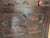 This Jacobean sideboard is crafted from rich, dark wood, likely oak, and features intricate geometric carvings with...