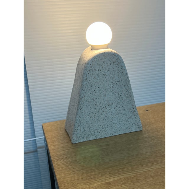 Design Plsu Gallery presetns the Kanamota Table Lamp from Virgian SIN. The Kanamota table lamp is named after Mount Saint...