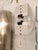 An extremely rare wall lamp, model ‘Fidia’, by Mario Botta. Designed and manufactured in Italy in 1985. White powder-...