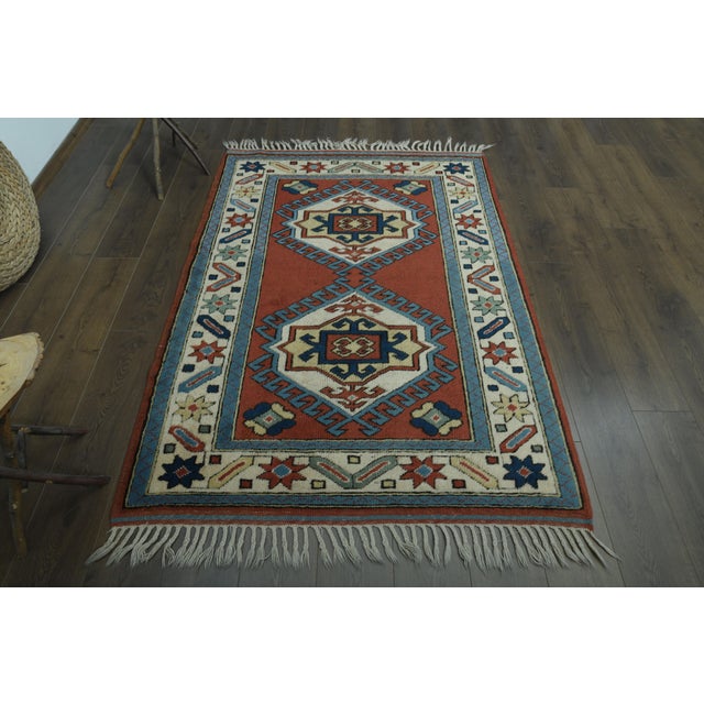 Vintage Turkish Hand-Knotted vintage rug is a semi-antique vintage area rug. The '70s Eastern region of Turkey's unique...