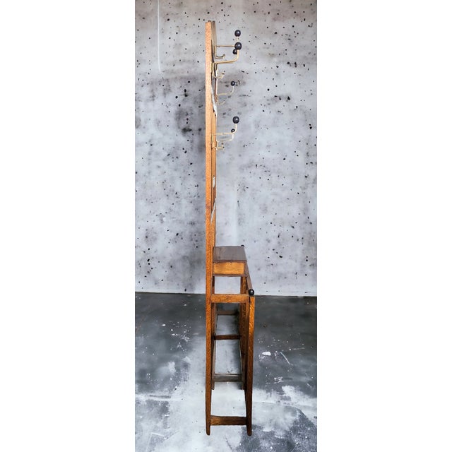 A gorgeous antique Douglas Fir Arts and Crafts Mission style hall stand/hall tree. Features six double hooks - totaling 12...