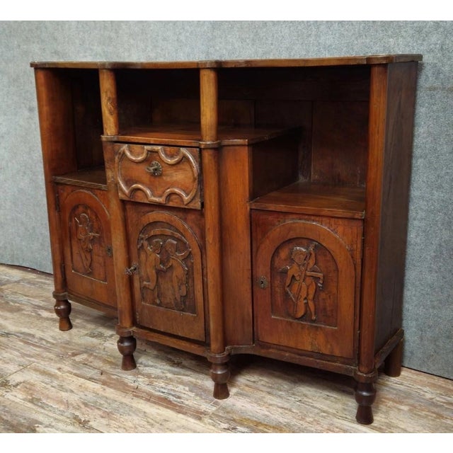 Antique Carved Solid Wood Buffet – Cherub Decoration – 19th Century Superb antique solid wood buffet, richly carved with...
