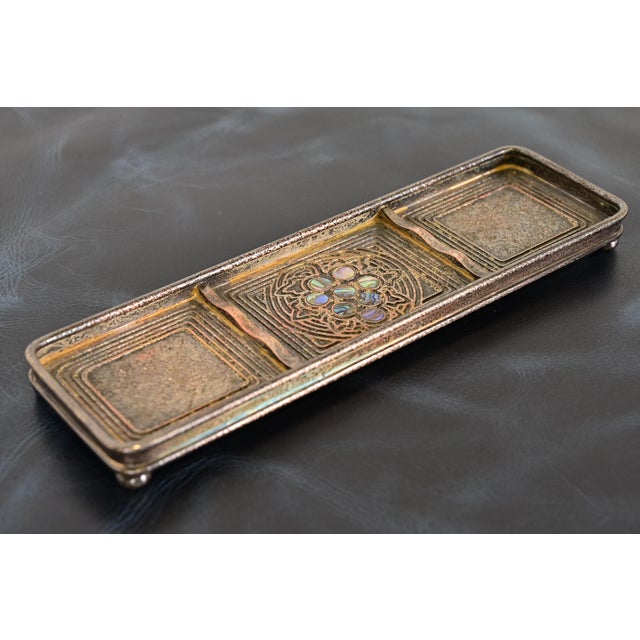 A gorgeous Art Deco or Arts & Crafts period silvered bronze and inlaid abalone pen tray By Tiffany Studios (signed to the...