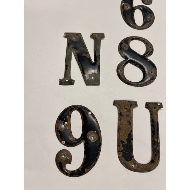 Vintage set of distressed metal letters and numbers direct from the Paris flea markets.